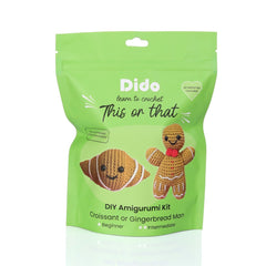 Green package of a DIY amigurumi kit featuring a croissant and gingerbread man design, branded 'Dido'.
